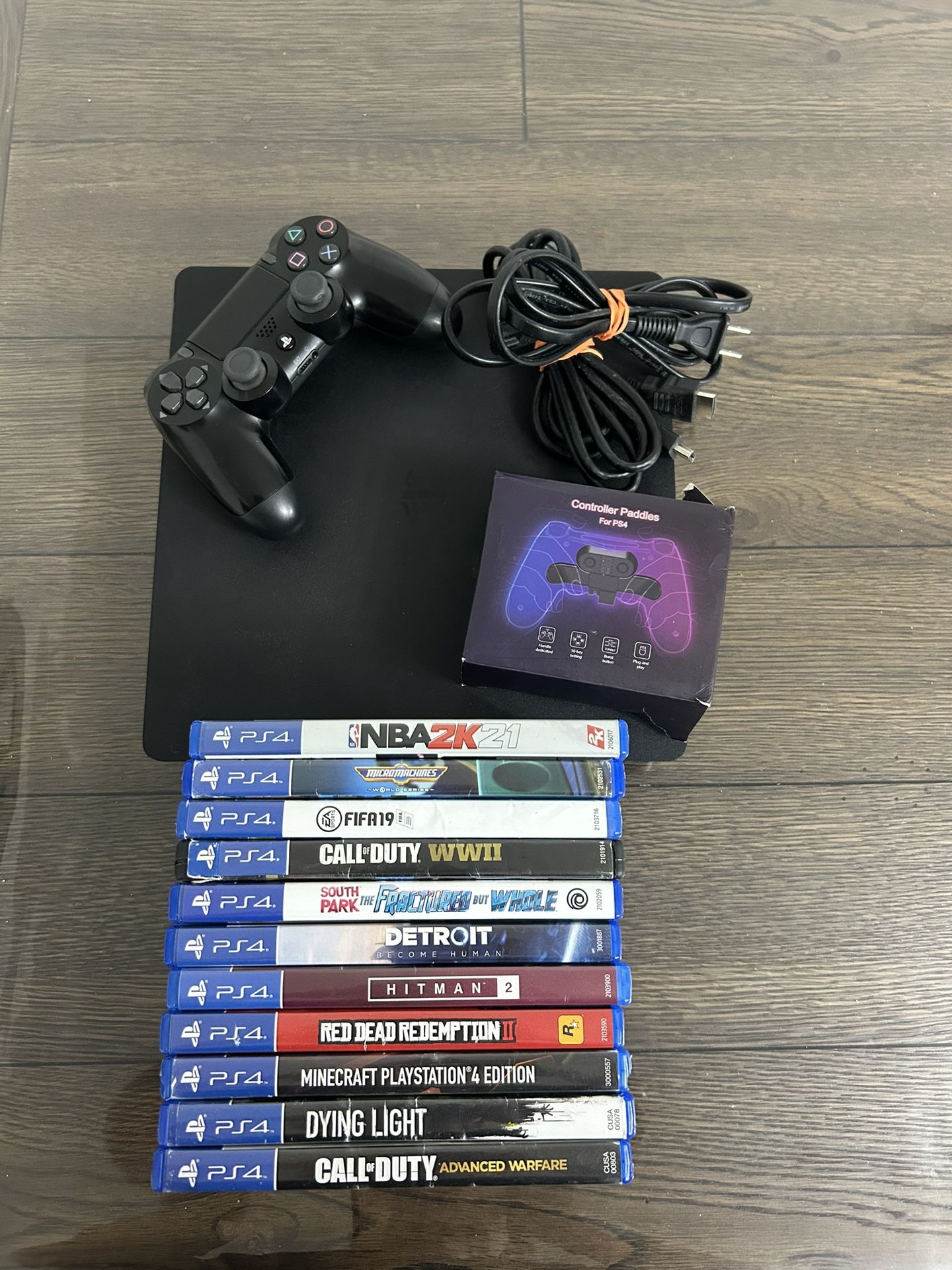 PS4 with games, and additional 2 paddles 