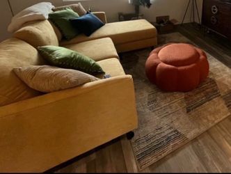 Yellow couch and rug for sale