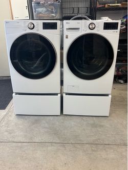 LG 27 in. Front load smart washer dryer with pedestal