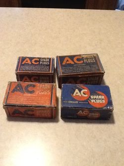 New in boxes 1930s-60s AC spark plugs