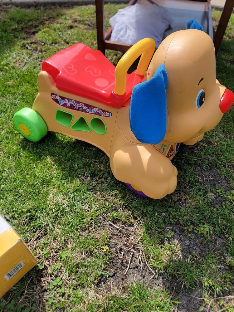 fisher price laugh and learn stride to ride puppy dog ride on walker