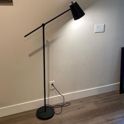 Modern Floor Lamp With Adjustable Arm And Height In Matte Black Metal Finish 