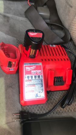 Milwaukee m12 battery and portable charger and charger