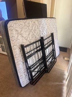 Full size mattress with fold up frame included