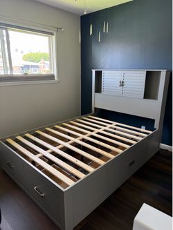 Full Size Gray Dalton bed frame from Bob’s (storage bed)