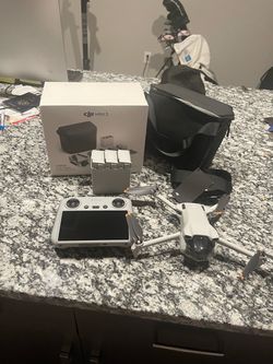 DJI Mini 3 Drone with RC Controller and Accessories