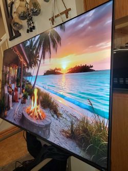 70" hisiense Google Android smart tv 4k great condition no legs  come with free swivel mount.  Has remote