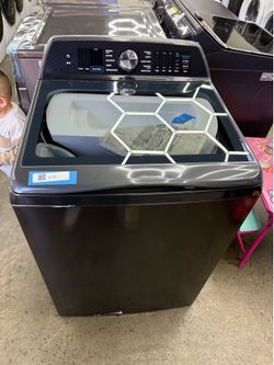Brand new GE Profile 5.4 cu. ft. High-Efficiency Smart Top Load Washer in Diamond Gray with Impeller, Quiet Wash Balacing Technology