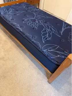 BRAND NEW SEALY Twin size mattress, free wooden frame
