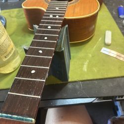 Totally FREE GUITAR SETUP INCLUDES STRINGS NOT A FREE GUITAR READ THE ADD!