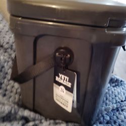 YETI Roadie 24 Hard Cooler in a charcoal color.