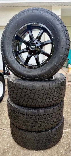 Moto Metal Wheels (6x5.5/6x139.7) w/ Nitto Terra Grappler G2’s (LT-325/60 R20)