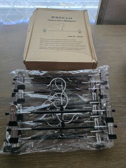 Adjustable hangers with clips-Perchas ajustable con clips