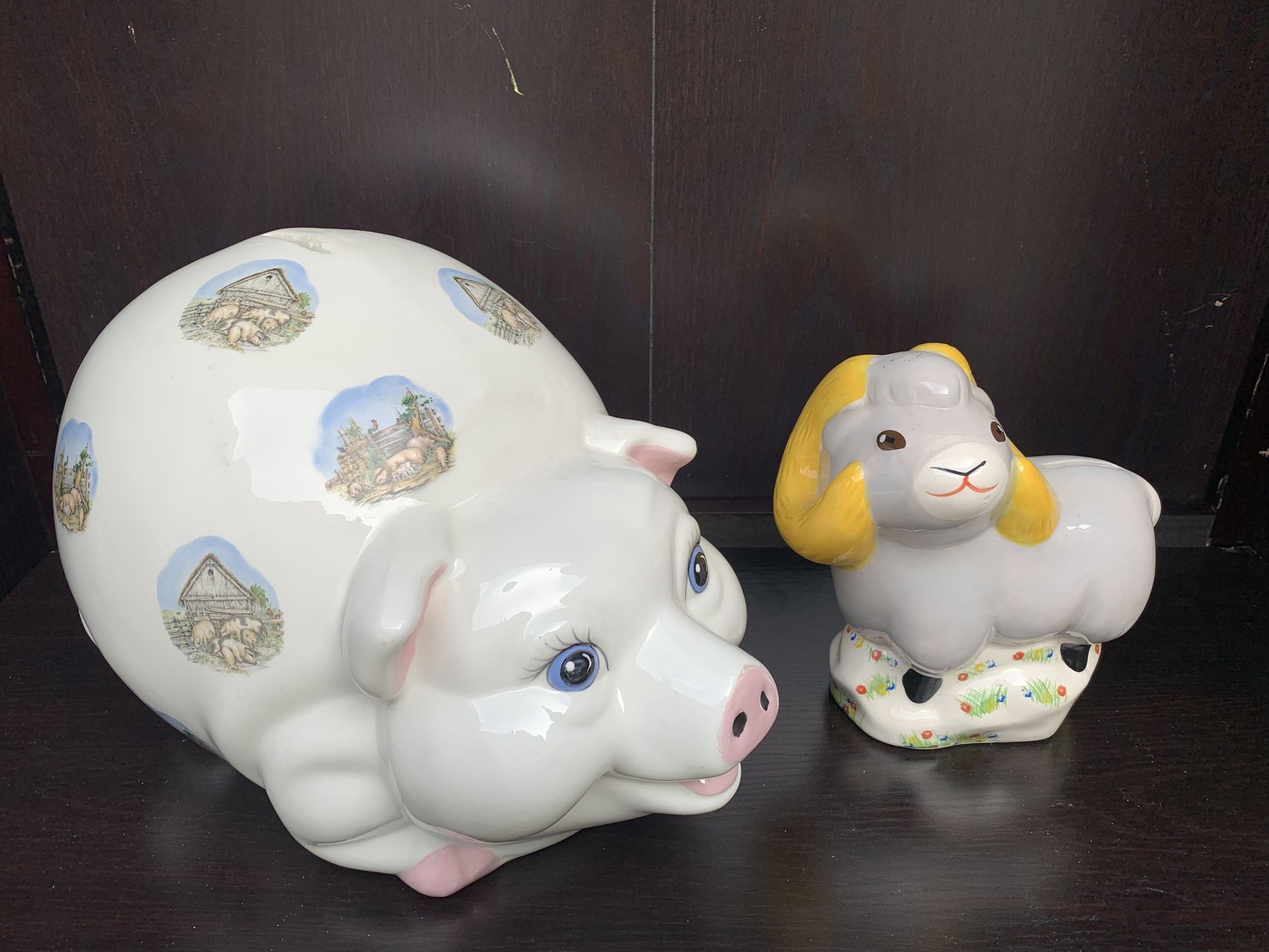 Adorable ceramic pig and lamb coin banks sold as a pair