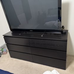 Black Dresser with six drawers and TV