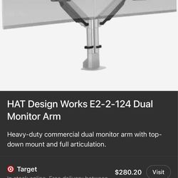 Brand new commercial dual monitor arm (never used). High-end Envoy system – supports 2 monitors with full adjustability (tilt, swivel, height).
