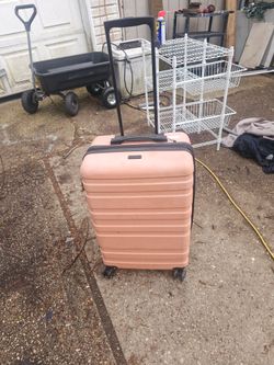Price is firm.. hardcover swivel travel luggage