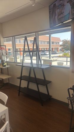 Modern Black Ladder Display Shelf – $250