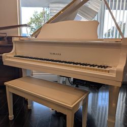 White Baby Grand Piano