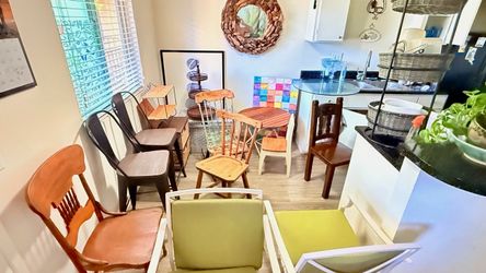 Chairs, mirror, artwork, small table