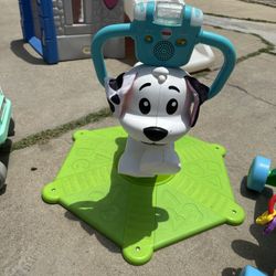 Fisher price puppy ride 