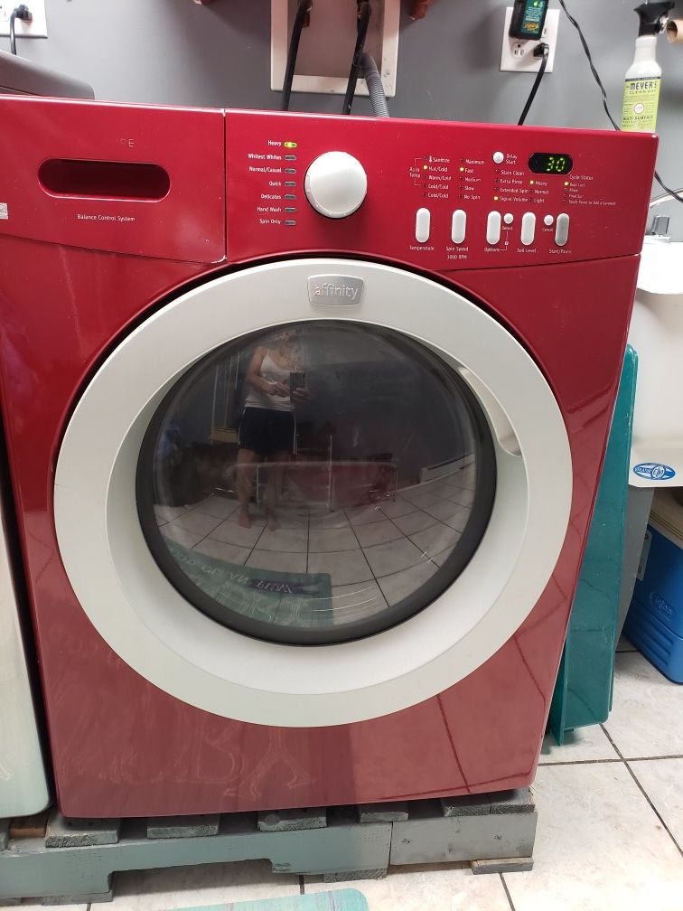 Red Frigidaire washer and GAS dryer