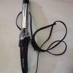 PERFECTION CURLING IRON.
