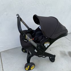 Doona Infant Car Seat & Stroller with Base – All-in-One Travel System