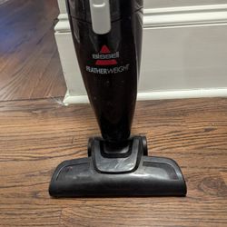 Bissel Feather Stick Vacuum. Handheld Black