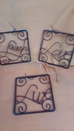 Three little wall hangers