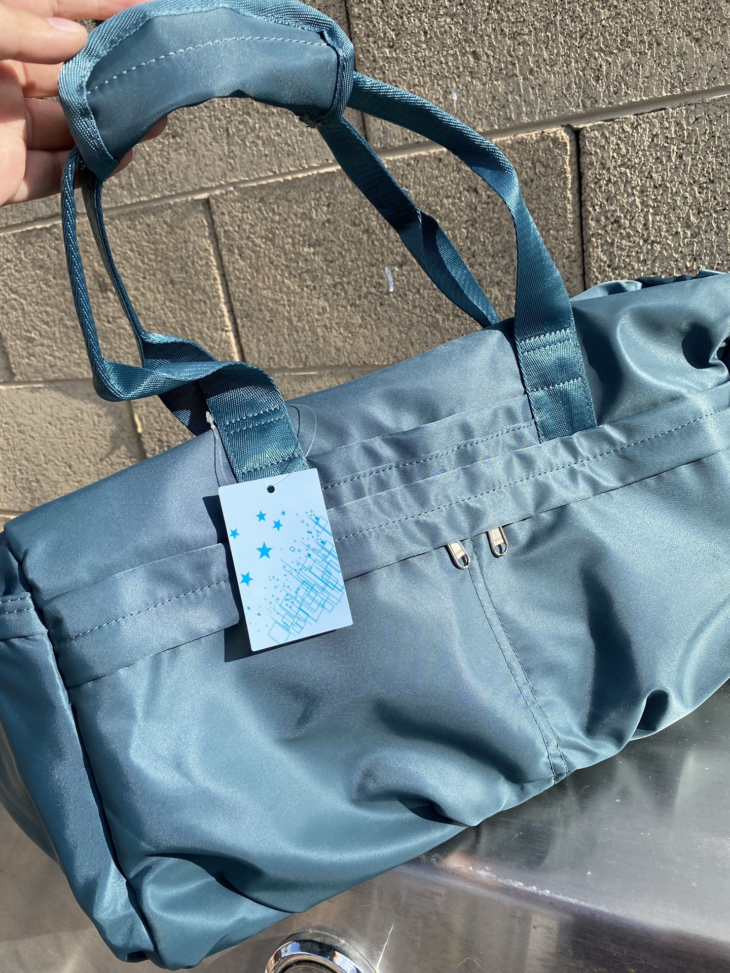 Green duffle bag