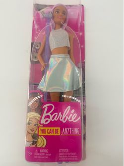 Mattel Barbie Pop Star Doll featuring long pink hair .