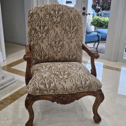 Elegant Carved Wood Accent Chair with Upholstered Damask Fabric