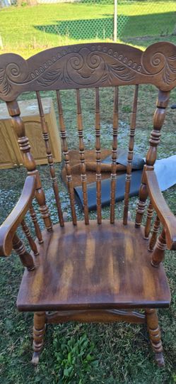 Antique Wood Rocking Chair with Carved Back