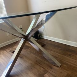 Contemporary Round Glass Table with Metal Cross Base