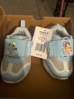 Two New pairs of toddlers , tennis shoes, size 6 New Balance and Bluey