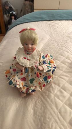 Porcelain Baby Doll with Heart Print Dress