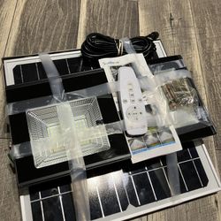 SunBonar solar-powered LED flood light with a remote control and separate solar panel. 