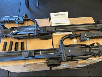 Rhino Rack crossbars (2) and bike carriers (2)