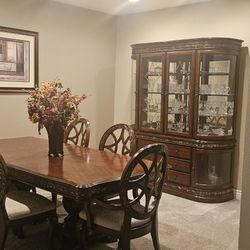 Solid wood, six person dining room table and hutch