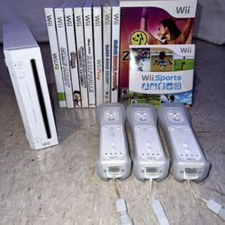 Wii console with (10) games 