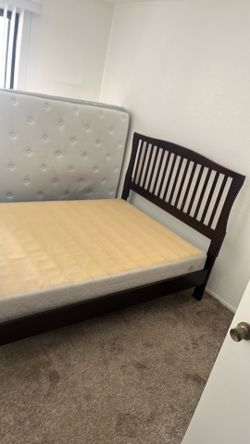 Free bed frame full size and free box spring.