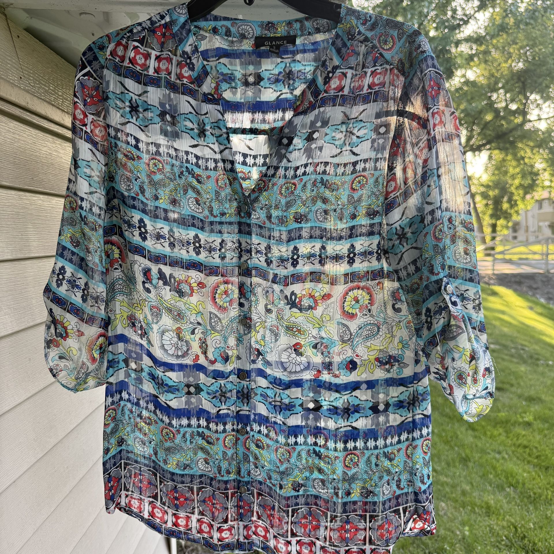 GLANCE Women's blouse with a vibrant, multi-patterned design small