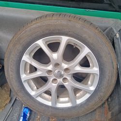 Jeep Rim And Tires Excellent Condition 