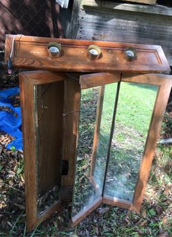 Bathroom cabinet with light fixture