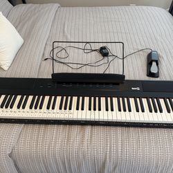 RockJam 88-Key Digital Piano with Semi-Weighted Keys.