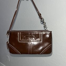 Coach Brown Patent Leather Wristlet