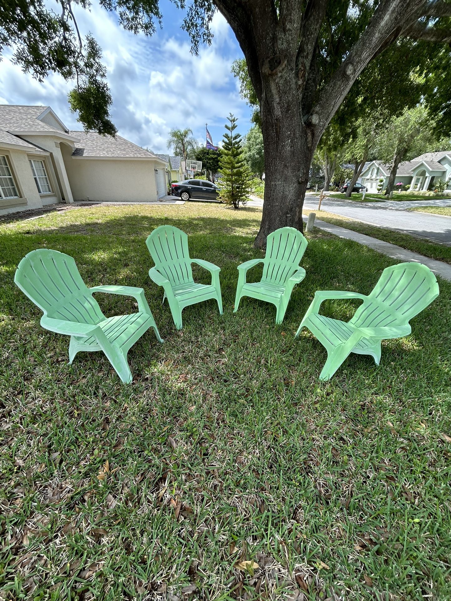 4 Outdoor Adirondack Chairs (plastic)