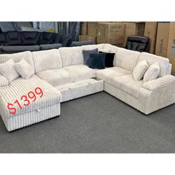 Corduroy Fabric Upholstered U-Shaped Sectional Sofa with Pull Out Bed and 6 Throw Pillows.