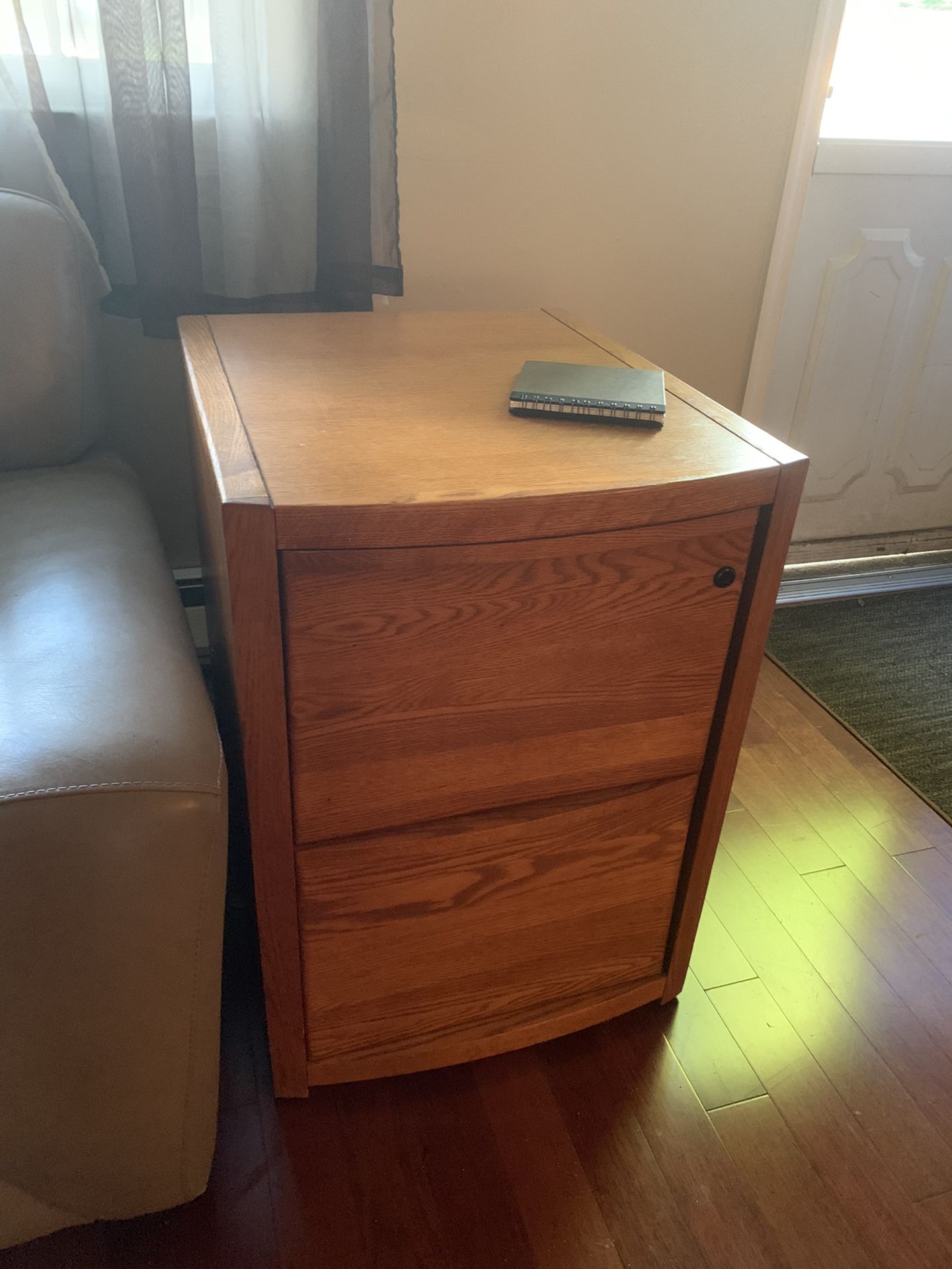 2-drawer filing cabinet. SOLID OAK! No junky Particleboard. $65 or best offer holds both legal size and let her size files. Very good condition.